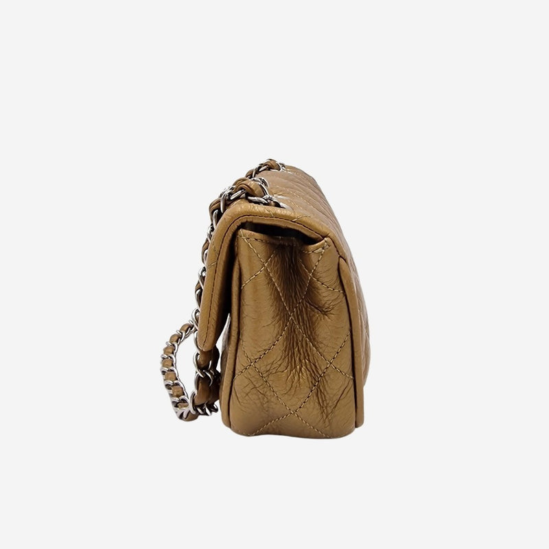 Dark gold east west flap bag