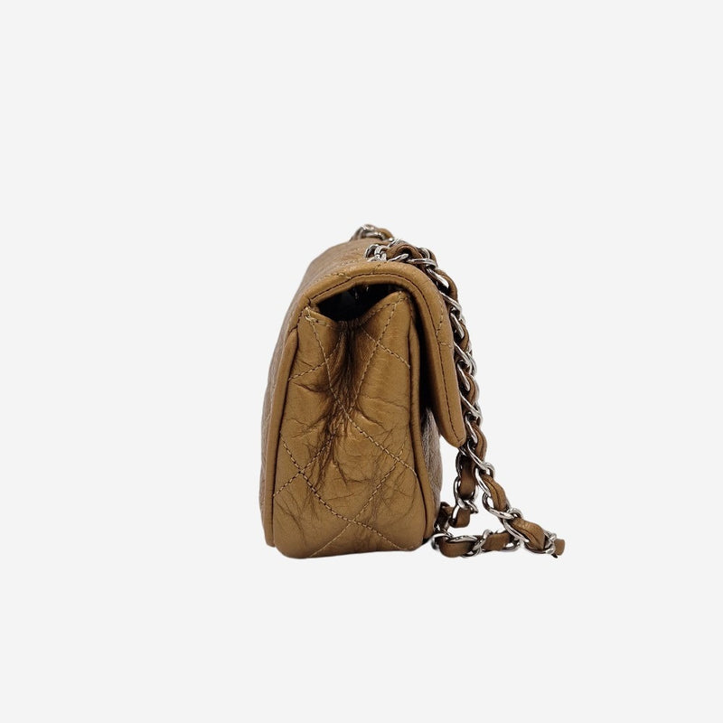 Dark gold east west flap bag