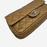 Dark gold east west flap bag