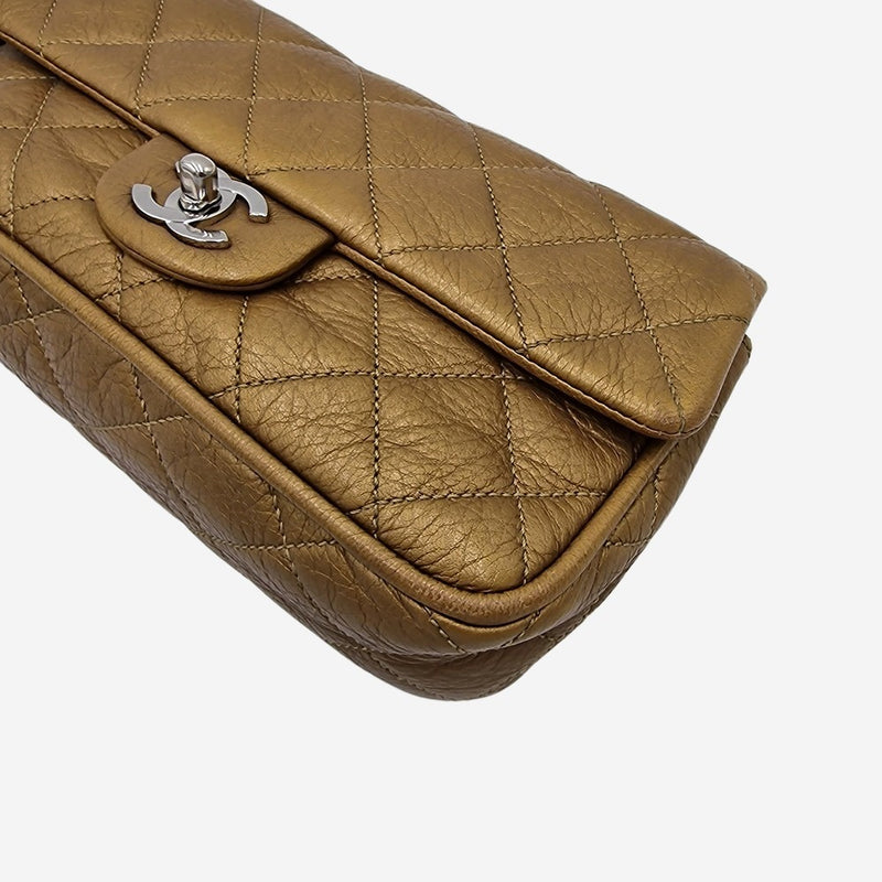 Dark gold east west flap bag