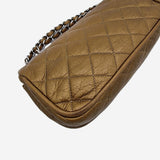 Dark gold east west flap bag