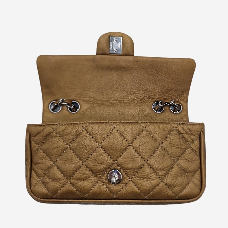 Dark gold east west flap bag