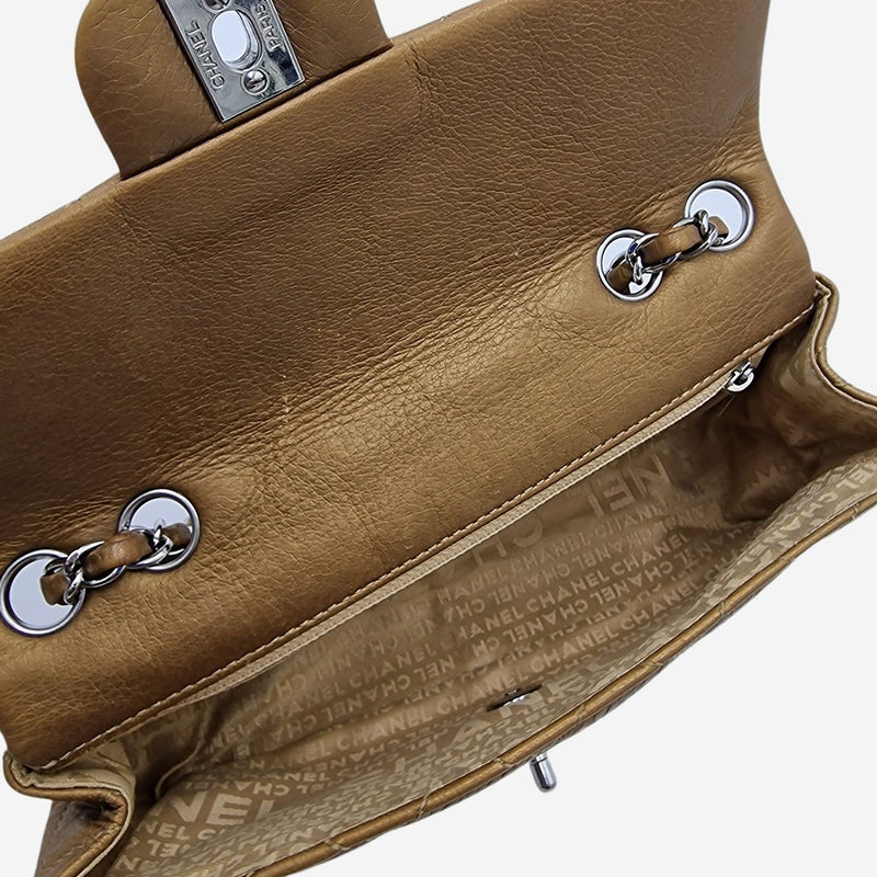 Dark gold east west flap bag