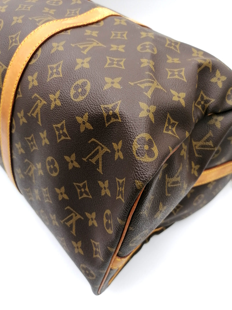 Sold at Auction: LOUIS VUITTON (Printemps-été 2016) SAC Keepall en toile  Monogram Palm Dots et cuir naturel, garnitures en laiton doré, anse b