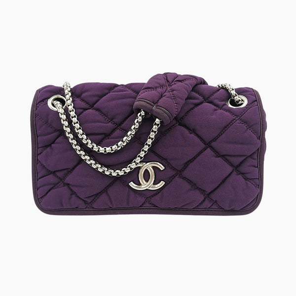 lilla bubble quilt flap bag taske fra brand: CHANEL - We Do Vintage