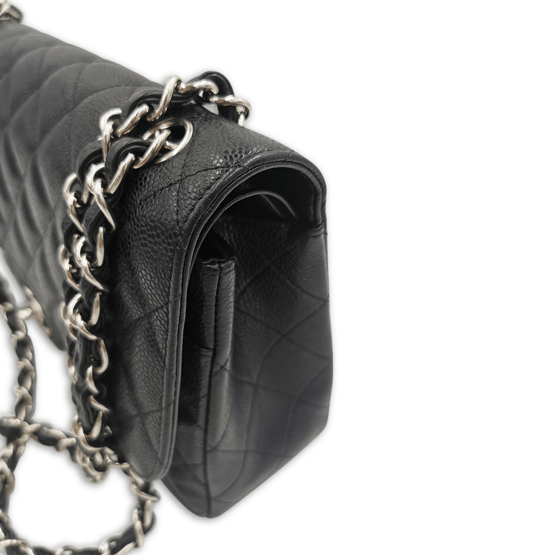 Sort caviar jumbo Classic double flap taske fra brand: CHANEL - We Do Vintage
