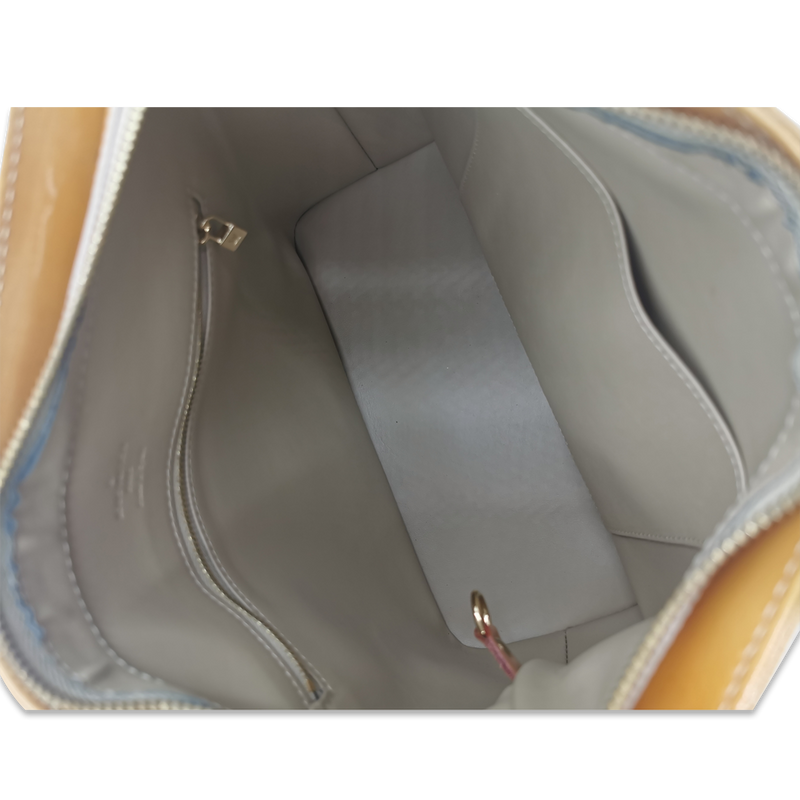 Gul vernis houston taske fra brand: LOUIS VUITTON - We Do Vintage