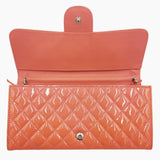 Orange patent woc taske fra brand: CHANEL - We Do Vintage