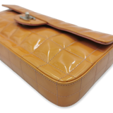 Orange patent east west chocolate bar taske fra brand: CHANEL - We Do Vintage